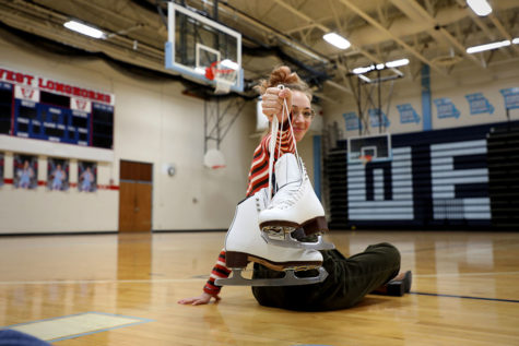 Preparing for the ice rink, senior Kristen Priest holds her ice skates before her practice on Wednesday. Priest is grateful for the variety of her schedule with the addition of Ice skating. “I think its really cool to end the day doing something fun,” Priest said. “I am very glad to be back and moving again.”   

