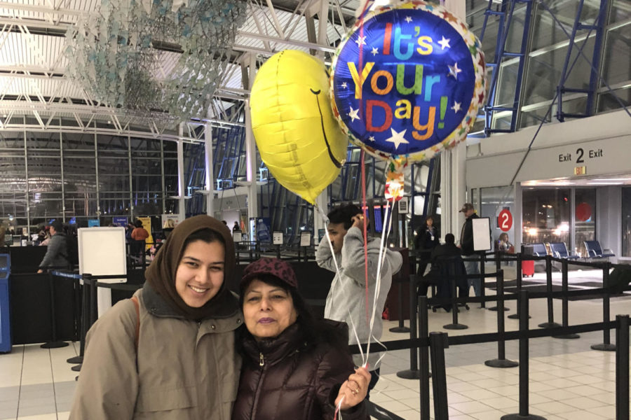 Standing next to her mother, senior Hira Khan smiles, showing her relief to finally be back in St. Louis. Because of her airport experience, Khan realized that she will have to be more independent. “I now know that I won’t always have my siblings or parents to do everything for me and that there are some things you have to learn to do on your own, no matter how difficult it is,” Khan said.