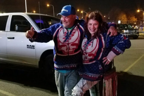 Special Education Teaching Assistant Karen Graycheck poses with her Deadhead apparael and light-up shoes.  Graycheck has been following Dead and Company for more than 35 years and has attended more than 100 shows. I love the band so much because it’s my happy place,” Graycheck said. “The lyrics in the music are all about happy thoughts; it’s a whole different culture.”