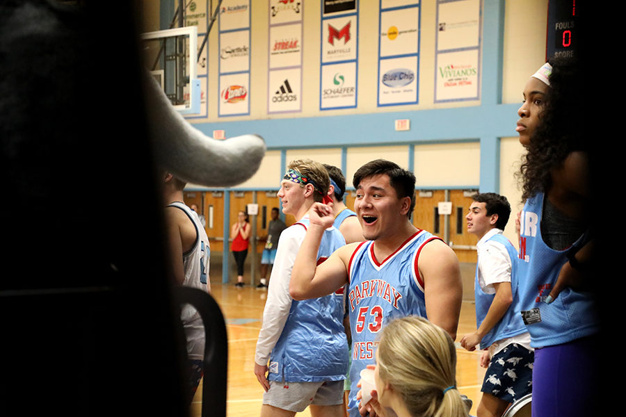 Pumping his fist in the air, senior Harry Skordos cheers his teammates on during the senior vs faculty basketball game. The event benefited the Friends of Kids with Cancer organization, and children who are diagnosed were asked to attend the game and participate by playing games during halftime. “My favorite part of the event was helping the kids during halftime. It is always so rewarding to be with people like that because it makes you appreciate the small things in life,” Skordos said.