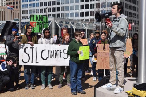 Senior Noah Wright delivers a speech at the St. Louis Youth Climate Strike US in front of a crowd of 100. Wright was a lead organizer for the event after being inspired by what he learned in AP Environmental Science and Honors Environmental Sustainability. “For decades, our politicians have failed us by doing so little when we need so much. It is my hope they see crowds like this across the country and realize that the time for denial is over,” Wright said. “To our politicians we have one message: take action against climate change or we will vote you out.”