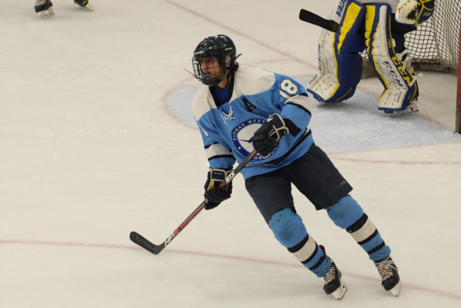 Gliding on the ice, senior Tarek Baig demonstrates sportsmanship and drive as a team captain. As a captain, Baig attempts to create a hardworking environment to promote success for his team. “Making the right plays on the ice and working as hard as possible sets a good example of what success costs day in and day out. I tell people ‘nice play’ or lines like that so they know people are watching and are happy with how theyre playing,” Baig said.