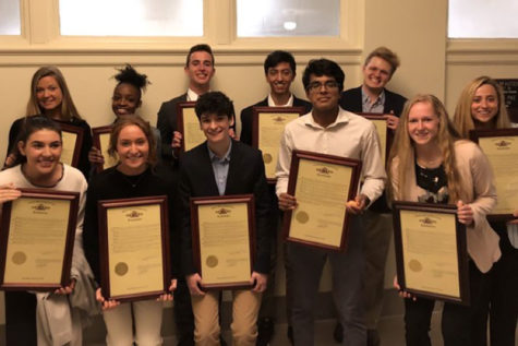 The awarded seniors pose for a picture in the hallway outside Derek Grier’s office on their way to be recognized on the House floor. Each student was awarded one of the virtues of Missouri that surround the house ceiling. “I was awarded ‘law,’ and I think that’s because I’m a very morally driven person. I base most of my life around ethics, and use that to lead others,” senior Bella Hatzigeorgiou said.