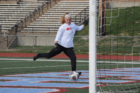 Warming up before the game against Fort Zumwalt East, senior Erika Anstine, the varsity goalkeeper leads her team to a one to zero victory. As of April 11, of the seven games played [and won], Anstine has only had four goals scored against her. “Im really excited for this season, I think there is a lot of skill on this team and we are off to a really great start, being undefeated. I think this season will definitely be a good one and Im excited to see where it goes,” Anstine said.