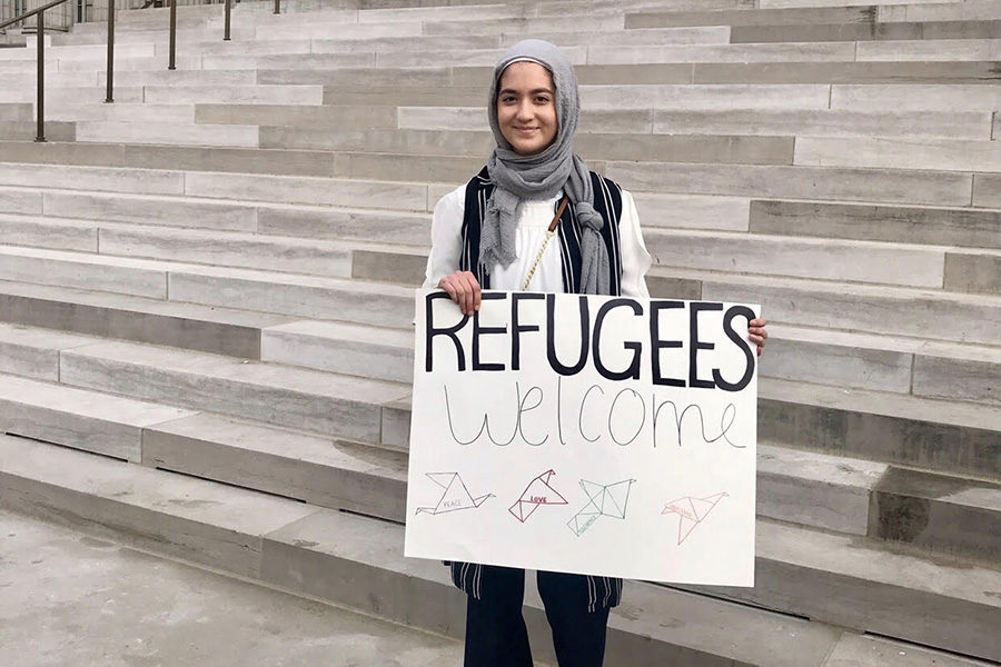 Standing in front of the Missouri capitol building, sophomore Ulaa Kuziez shows her support for Syrian refugees. Kuziez visited Jefferson City with the Council of American and Islamic Relations (CAIR). “There are definitely some negative aspects to standing out, being a Muslim immigrant in a majority white high school,” Kuziez said. “At times it can get a little uncomfortable or a little awkward, but I choose to be unapologetic about my identity and about being a Muslim, Syrian-American woman.”