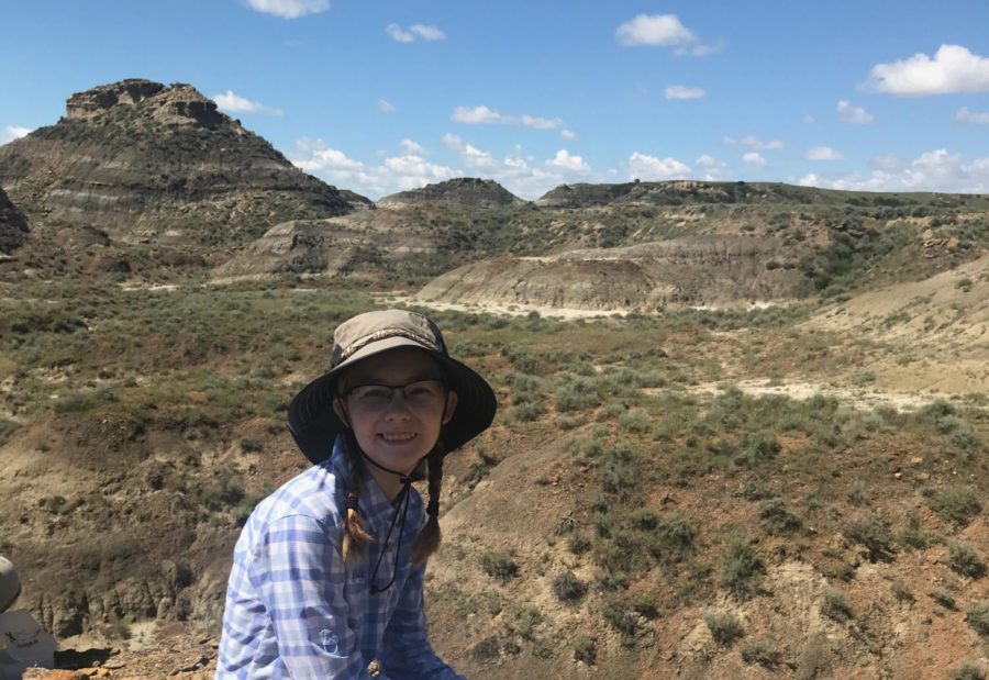 Sophomore Tenley Bertz sits in front of the digging site in eastern Montana, munching on a sandwich before she begins her search for dinosaur bones. Bertz is one of the very few people that got the opportunity to participate in the dig. “I feel really lucky to have this opportunity to participate in this program,” Bertz said. “I like it a lot, and I know it is definitely not a common thing for someone to do, so I like to stand out.”