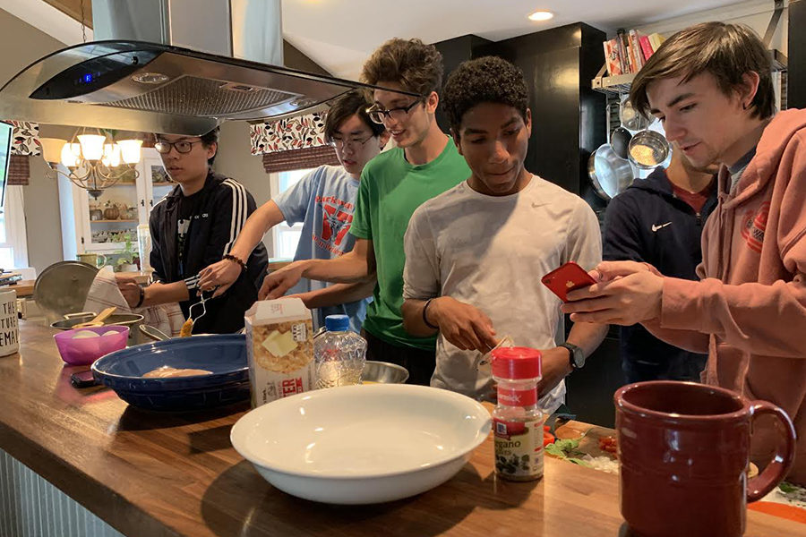 Seniors Stephen Zhao, Andrew Li, Caleb Canatoy, Joaquin Rendon and Noah Wright work in teams to create tasty dishes for a cooking competition, judged by seniors Maria Newton and Harper Stewart. The boys, also including seniors Tony Galanti, Paul Gipkhin and Umer Mallick, raced against the clock and each other to avoid the losers’ punishment of having some hair waxed off. “Having a friendly competition drove me to try my hardest so that my friends could be impressed,” Li said.