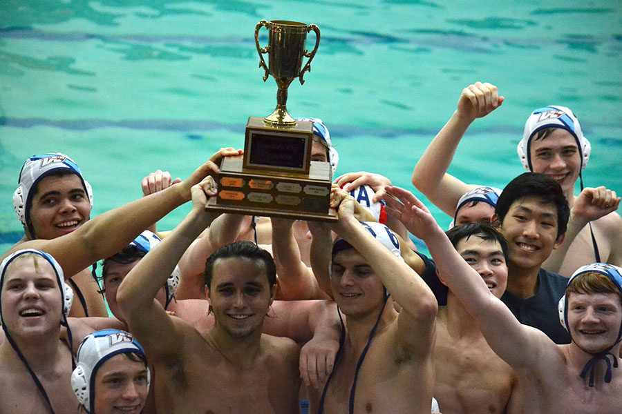 The varsity water polo teams celebrates winning the Founders Cup, a tournament hosted by Ladue High School April 6. The team competed against five other teams, ultimately defeating Ladue 20-2 for the title. In addition, the varsity water polo team placed second at state. “Winning the Founders Cup was definitely a highlight of the season. The weeks prior, we were having trouble running a smooth offense, but during this tournament, we ‘clicked’ and figured things out. In the final game, there was a lot of energy, and we played cohesively, which led us to the win,” sophomore McKay Morgan said. 