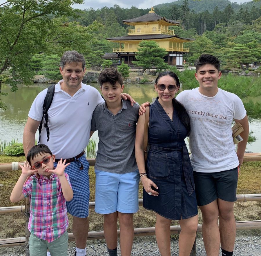 Visiting the Kinkaku-ji, a Zen Buddhist temple, sophomore Santi Lugo and his family pose for a photo. The temple, also known in translated Japanese as the “Temple of the Gold Pavilion,” is one of Japan’s most popular buildings. “It was a long trail, trees all around, and the sound of rocks being stepped on crowded my ears. When you’re walking, you’re unable to see anything until suddenly you see a gold point rising above the trees that leads to the peaceful stream below the astonishing temple,” Lugo said