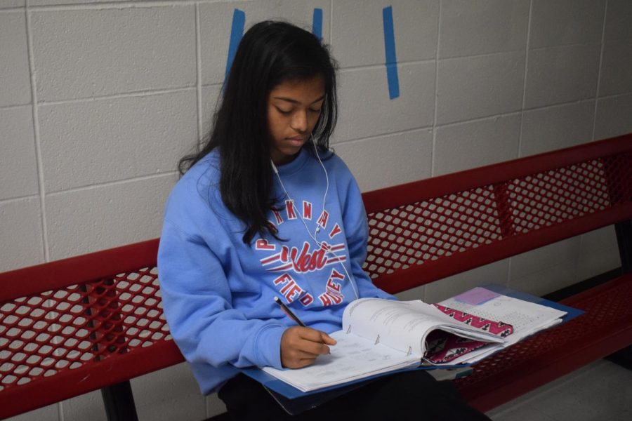 Sophomore Trisha Manna works on her notes for AP Computer Science.
