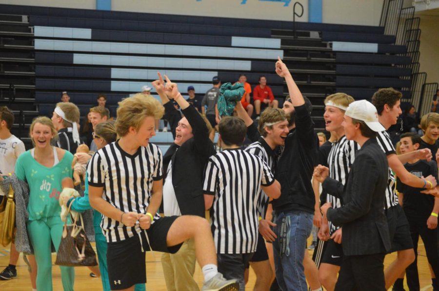 Celebrating the dodgeball victory, the Zebras coach, senior Nick Boland raises two fists in the air. The Zebras later went on to win the whole tournament. "It was an amazing feeling," Boland said. "Although I didn't play I still felt like a winner after it was all said and done."