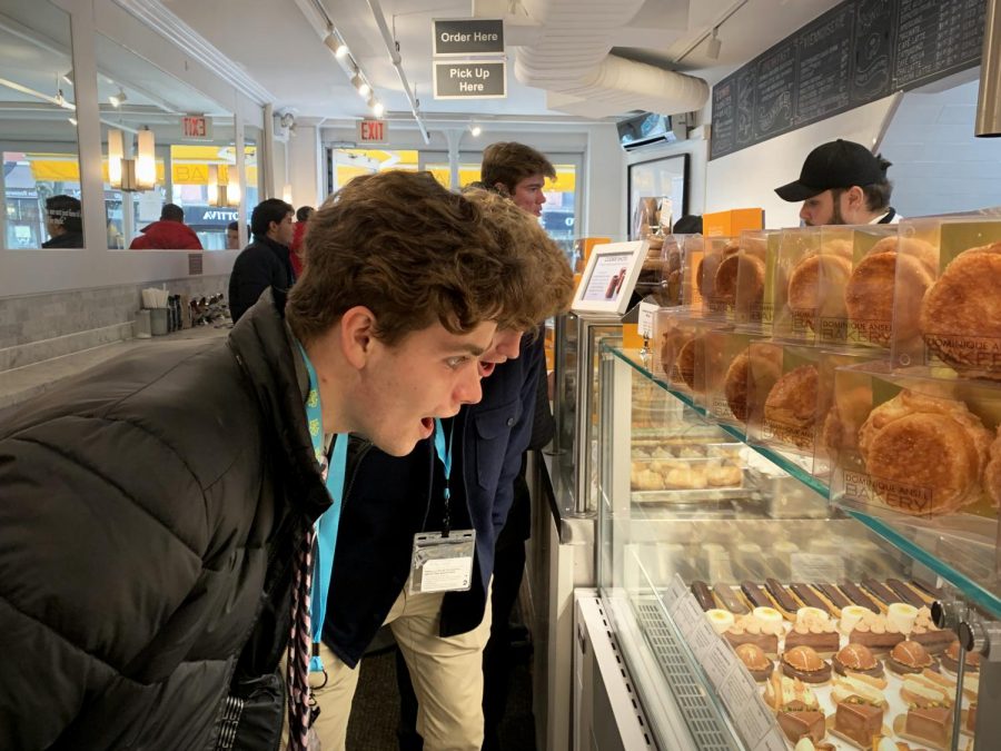 Eyeing up breakfast options, seniors Nolan Barbre and Jake Juenger take in the sights and smells of Dominique Ansel Bakery during their first morning in New York City. Marketing students go on an annual trip to tour New York’s major businesses and learn about marketing strategies. “I got a piece of chocolate cake for breakfast, which was a pretty great start to the day,” Barbre said. “Everything in New York is so much fun and totally different than an everyday routine back at home.” 