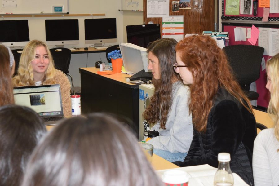 Editor In Chief Sabrina Bohn shows the group of editors an idea for the week on her laptop at an editorial board meeting on Friday mornings. Bohn then edits the agenda for the week according to what the group needs to get done that weekend or the next week, by managing and overseeing the workload. I work in class everyday–I’m a cadet teacher for Klevens, and I take CJ4–and the editorial board meets every Friday morning. I also work at home when I need to. Newspaper is a big time commitment, but since I really enjoy it, it doesn’t feel hard or even like other school work at all, Bohn said. 