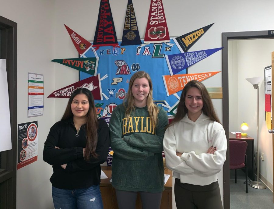 Seniors Umeera Farooq, Quinn Berry and Charlotte Zera stand in front of the College and Career center. After seeing their classmates express interest in where everyone is going, they planned a senior send-off map to share everyone's plans post graduation. “We have been in the College and Career center a lot lately,” Zera said. “The college process is stressful, but I’m glad it is almost over. I’m excited to see where everyone goes.” 