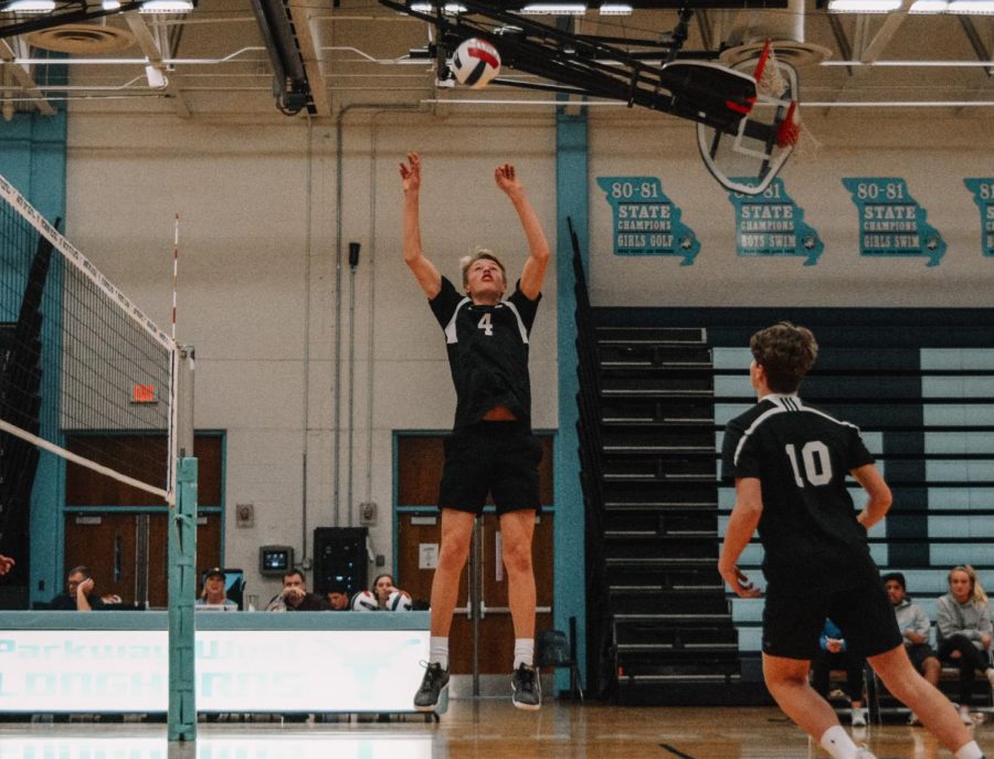 Jumping+to+set+a+ball%2C+sophomore+Ethan+Jennings+assists+an+attack+for+junior+Evan+Conger.+Jennings+played+JV+volleyball+his+freshman+year+and+continues+to+play+for+the+High+Performance+Volleyball+program.+%E2%80%9CPlaying+with+older+guys+was+great+because+it+gave+me+a+unique+experience+that+most+guys+my+age+don%E2%80%99t+usually+have+and+pushed+me+to+work+harder%2C%E2%80%9D+Jennings+said.