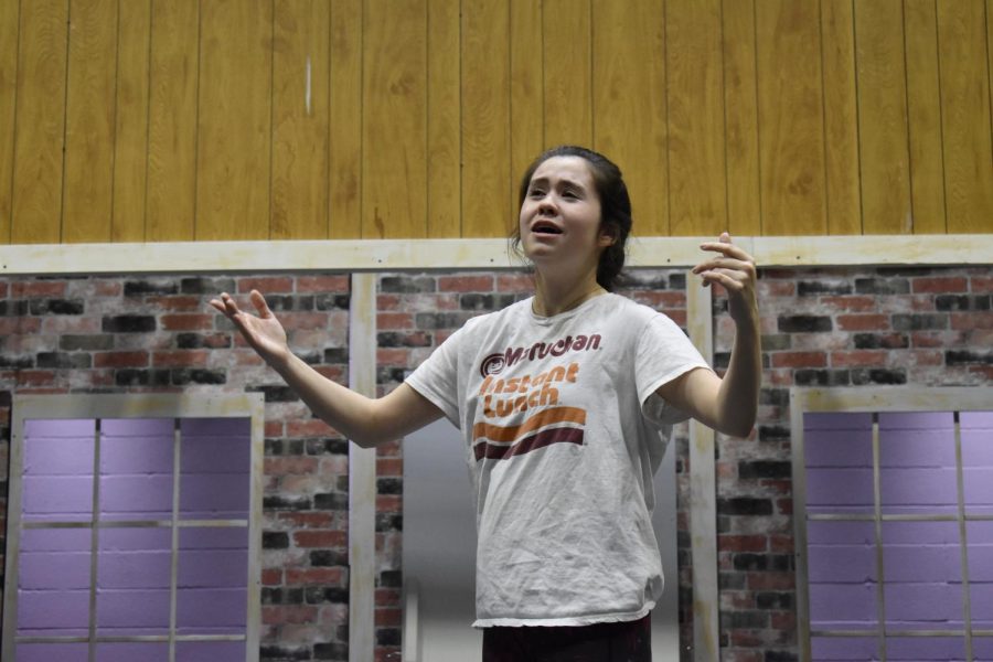 Portraying the character Janet Van De Graaff, junior Arden Dickson rehearses a scene from “The Drowsy Chaperone.”