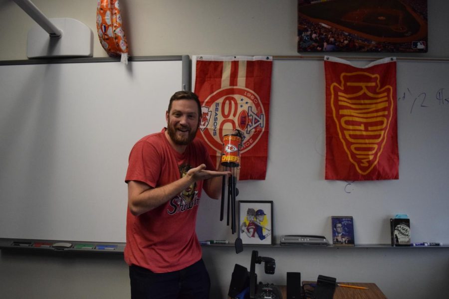 English teacher Casey Holland drinks coffee out of his red Chiefs cup as a superstition.