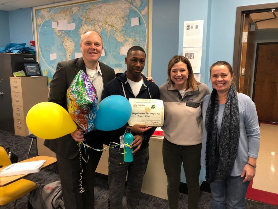 Principal Jeremy Mitchell, freshman Jordan Allen, Language Coordinator Amy Belding and Spanish teacher Dominique Navarro pose for a photo to congratulate Allen on winning a travel scholarship to the Galapagos Islands from Just Overseas. Allen, Mitchell, Belding and Navarro presented the scholarship to Allen while he was in Modern United States History class. “I was extremely surprised and thankful when I was presented with the scholarship because it had been a while since I had applied and I knew that other people applied as well,” Allen said.