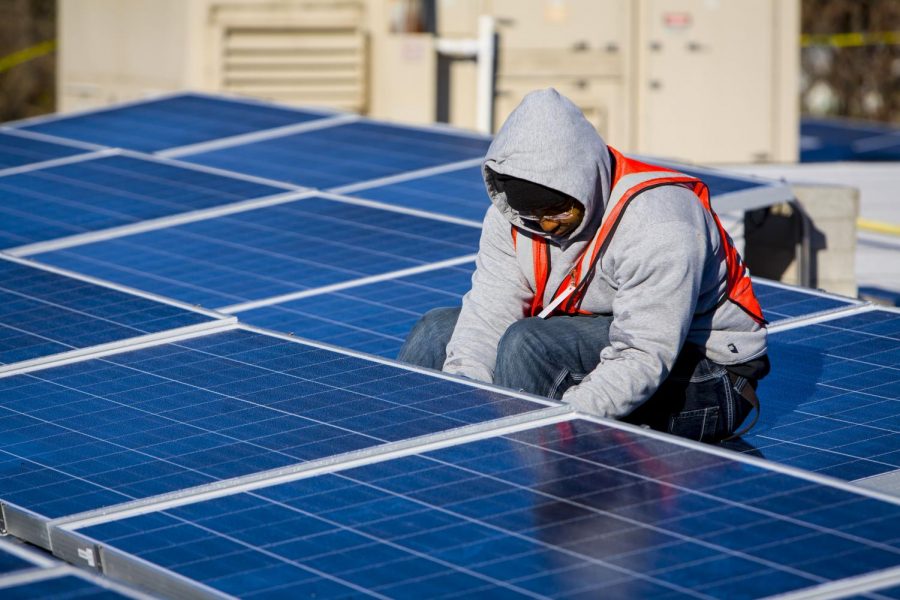 A Solar Installer from Bright Energy Solar finishes installing the first array of solar panels on a Parkway roof. These specific panels were put on six years ago, but they were just added to last summer. “The most recent 75 kW installations that were put up at West High, South High, Green Trails, and Wren Hollow were completed by Straight Up Solar,” Lueders said.