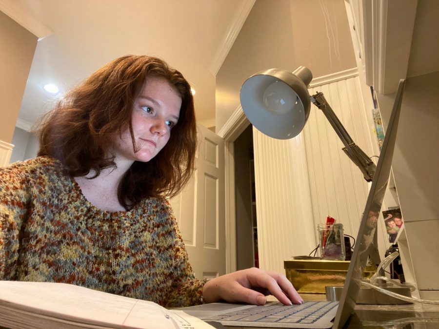 On her desk at home, junior Emma Bateman completes her math homework. This is also how and where Bateman plans to take exams for AP Physics I and AP Government. “Honestly, I’m not happy about the testing [being] online because I focus better in a classroom or testing environment than my room,” Bateman said. “Also, I don’t like that its going to be all FRQ based this year.” 