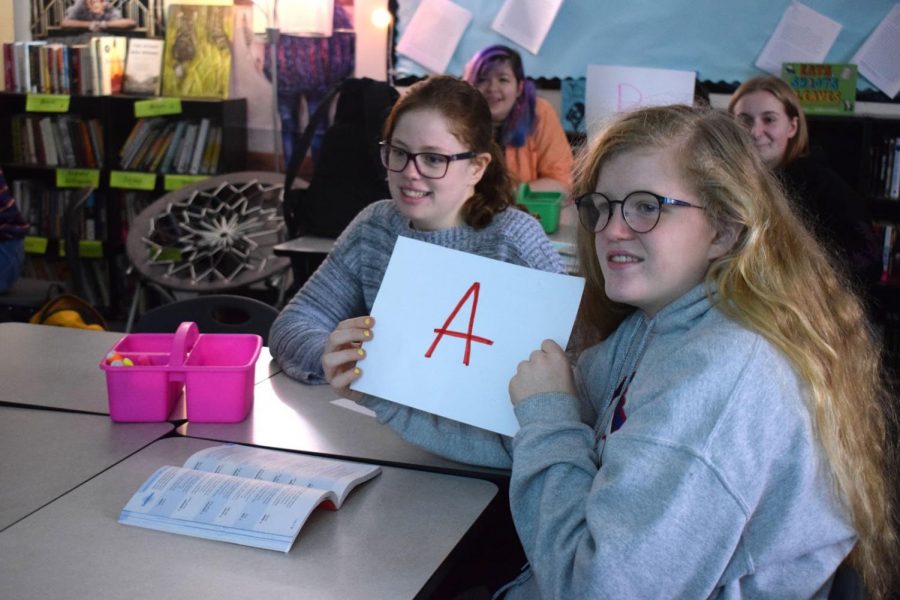 Competing in a Great Gatsby themed Trivia Crack game, juniors Acadia Vance and Karen Trevor-Roberts respond to a question regarding chapter five in English III teacher Erin Fluchel’s class. The game, coded by senior Ronik Bhaskar, was created as a fun way to discuss and analyze the book. “It helped me study a lot and it was a lot of fun,” Trevor-Roberts said. “It was engaging because we got to write the questions, and playing the game helped us dive deeper into the book.” 