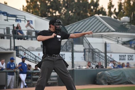 Putting his arms up to strike the batter out, alumnus Trevor Dannegger makes the call behind home plate. Dannegger started officiating minor league baseball games in 2016, along with being a substitute teacher in his time off. “I try to stand out in both roles,” Dannegger said. “Whether it be asking a teacher to continue their lesson instead of showing a video or going out of my way to help players on the field.”
