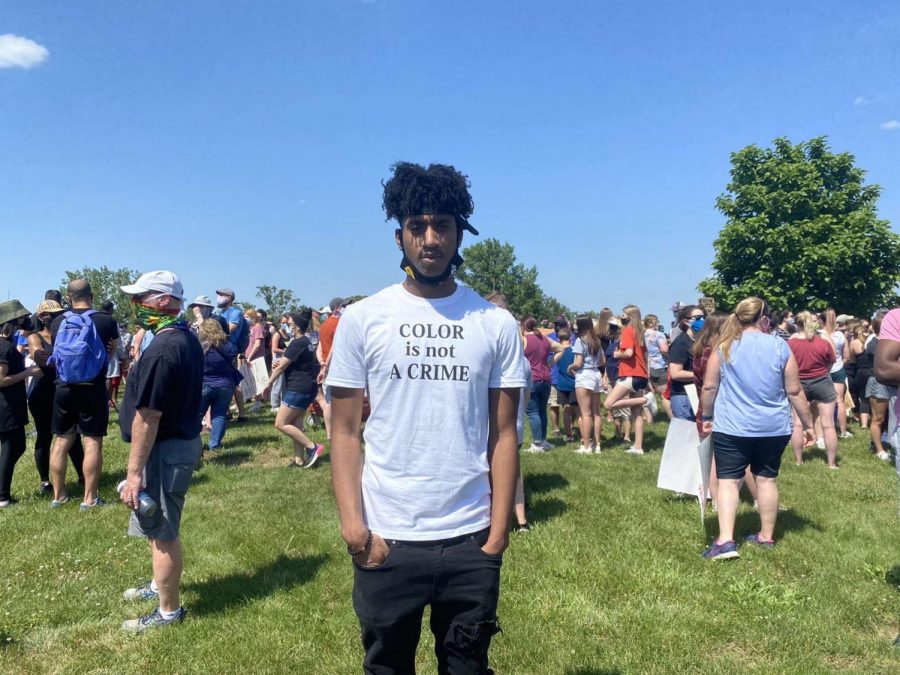 Wearing+a+shirt+in+support+of+the+protest%2C+senior+Cam+Redmond+shares+his+voice+through+his+clothing.+Redmond+attended+a+protest+held+at+West+to+support+Black+lives.+%E2%80%9CCrazy+things+that+have+been+happening+in+our+world+have+made+me+want+to+be+a+part+of+the+voice+that+Black+lives+and+other+races+matter+and+we+all+should+be+equal%2C%E2%80%9D+Redmond+said.