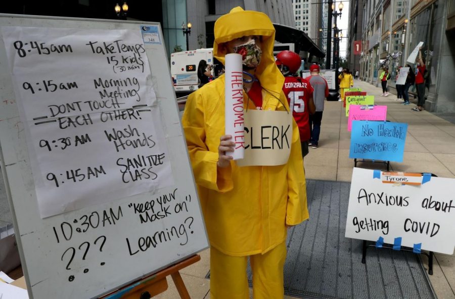 Teacher Andrew Van Herik protests outside Chicago Public Schools headquarters July 22.