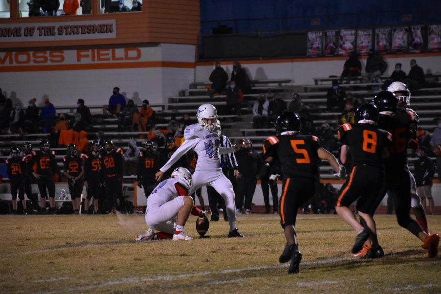 Kicking the ball deep into the end zone, senior Matt Cosgrove sends his team’s opponent, Webster Groves, back. Cosgrove started kicking for the team after his spring volleyball season was canceled last year. “I didn’t think we were going to have any games because I thought they would all be canceled due to COVID, but then we did, and I was excited,” Cosgrove said.  
