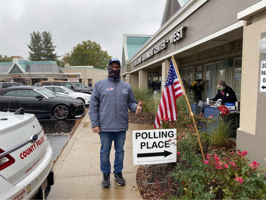 History teacher Zaven Nalbandian stands outside of a polling place at the St. Louis County Government Center. Nalbandian experienced socially distant lines, mask wearers and a comfortable and tolerant feeling in the air. “I stood in the rain for the chance to once again exercise my right. I was feeling nostalgic as I thought back to that Tuesday in November in 1988 when I walked into the gym at Francis Howell North High School and punched the card, Nalbandian said. St. Louis County is still using those old voting stands that look like ‘80s suitcases, but there are no more punch cards. I did get to keep the pen they gave me.