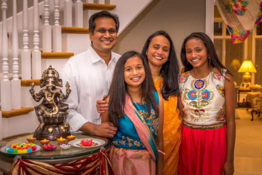 Celebrating Diwali, the festival of lights, senior Anjali Patnana poses with her family. Patnana practices Hinduism, and Diwali is a big celebration with family. “Diwali is so much fun, it’s nice [to spend time] with family,” Patnana said.