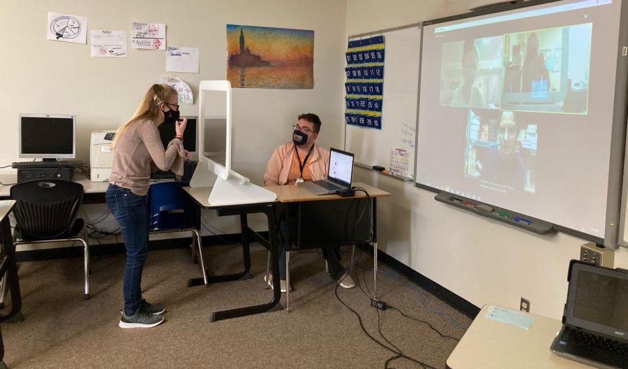 Speaking to an in-person student, Special Education teacher Zack Jodlowski works to teach both his in-person and virtual students. Jodlowski’s class was made up of deaf, Deaf and hard of hearing students. “I think it’s important for people to know there’s a wide range of people involved in our community,” Jodlowski said.