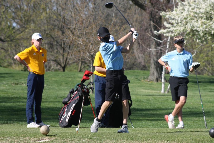 Practicing a drive at Ballwin Golf Course, freshman Joshua Saeger golfs with his partner, freshman Nicholas Powell, against Seckman High School. Saeger’s favorite part of the season was getting to play in the Marquette Tournament. “In a tournament you and your partner play the hole and you get to take the better score,” Saeger said. “Even though I was only in one tournament, experiencing the difference [between regular season and tournaments] was a super fun thing I got to do this year.” 