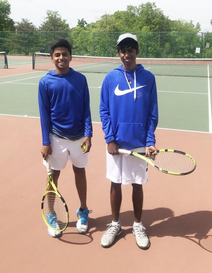 Freshman+Raj+Jaladi+and+senior+Sri+Jaladi+pose+for+a+photo+after+tennis+practice.+The+brothers+and+teammates+had+high+hopes+to+play+in+state+but+ended+their+season+losing+to+Priory%E2%80%99s+doubles+team+in+the+second+round+of+districts.+%E2%80%9CIt%E2%80%99s+not+like+we+don%E2%80%99t+get+along+at+home%2C+but+we+communicate+best+at+a+tennis+match%2C%E2%80%9D+Raj+said.+