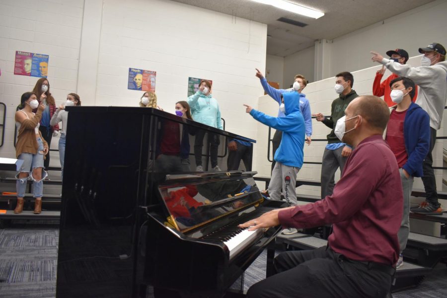 Coaching through rehearsal with the Jazz Choir, Parrish looks at what he has created. Jazz choir is one of many choirs Parrish directs and choreographs here at West. "Teaching music is still a rush every time I do it. I never count the minutes, I am never bored," Parrish said.