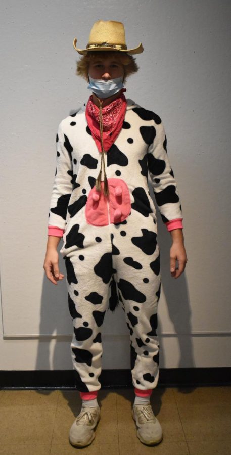 For Country versus country club day, sophomore Nick Widger wears a cow onesie and cowboy hat. “Its lame if you don’t [dress up],” Widger said. “Dressing up is fun and its a unique way to show off your school spirit.”