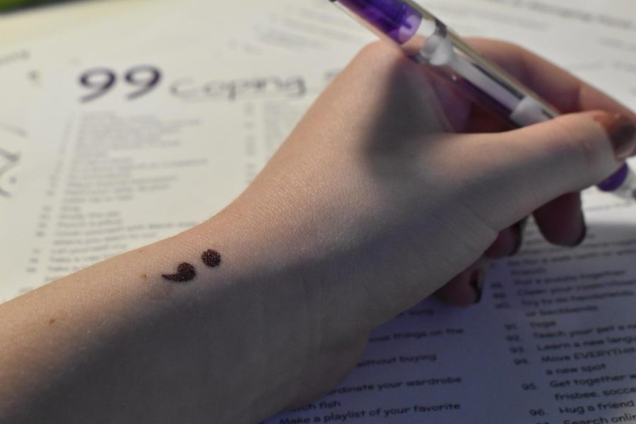 The semicolon tattoo is a symbol of perseverance for people who struggle with depression and suicidal thoughts.