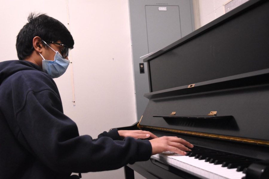 Freshman Samir Shaik practices the piano during Academic Lab time.