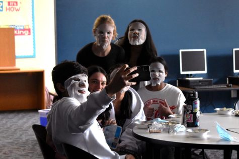 While taking a selfie, freshman Samir Shaik and his friends try on face masks. Skincare, a prominent part of South Korean culture, was focused on during the club meeting dedicated to the country. “[My friends and I] wanted to try something different in this club. They offered us facemasks and we were just like, ‘Of course we’d [try them]’. I had never tried a face mask and [neither had] some of my friends. So it was a mess trying to put them on, but it was so fun,” Shaik said. “I just love that this moment was captured in a photo.”