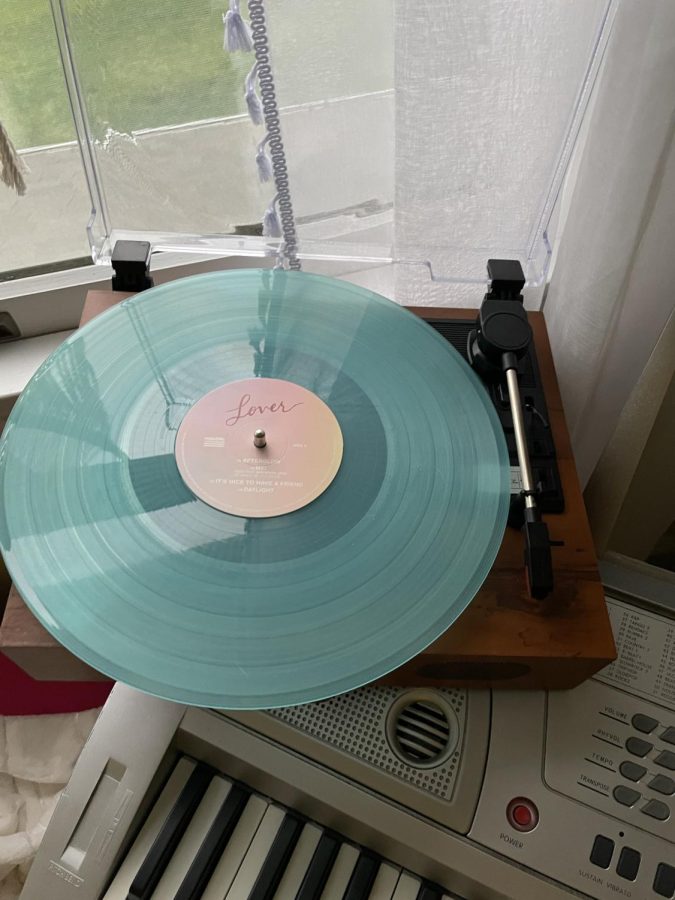 Vinyl collector, freshman Sadie Burgess plays “Lover” by Taylor Swift on her record player.