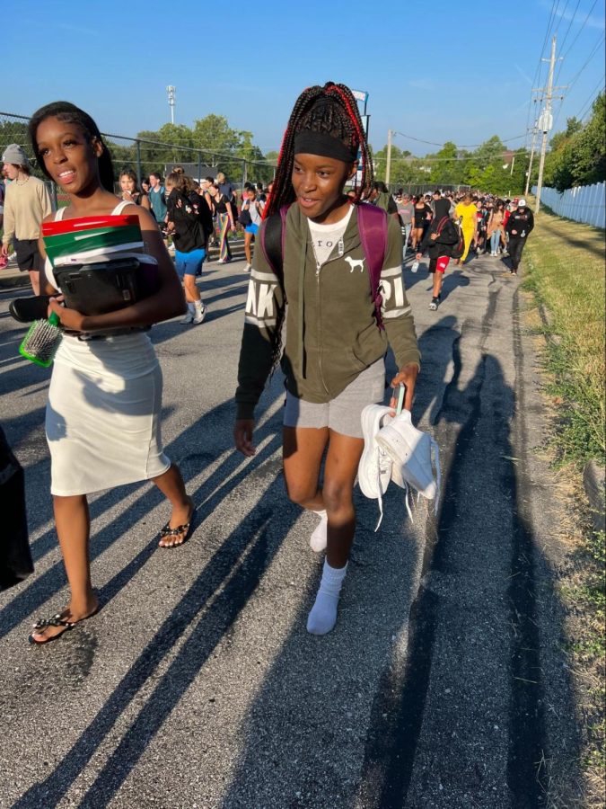 An unexpected fire alarm caused students to evacuate the building before school Aug. 26. Sophomores Makayla Hoskins and Kerra White walked back into the building, Hoskins walking in socks while holding her shoes. “It was wet outside, and I didn’t want to mess up my white shoes. I was making a TikTok, and out of nowhere, the fire alarm went off with no reminder,” Hoskins said.