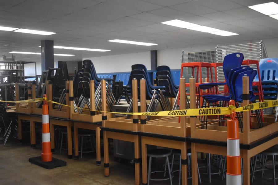 The art department’s furniture was laid out in the cleared locker bay at the start of construction.