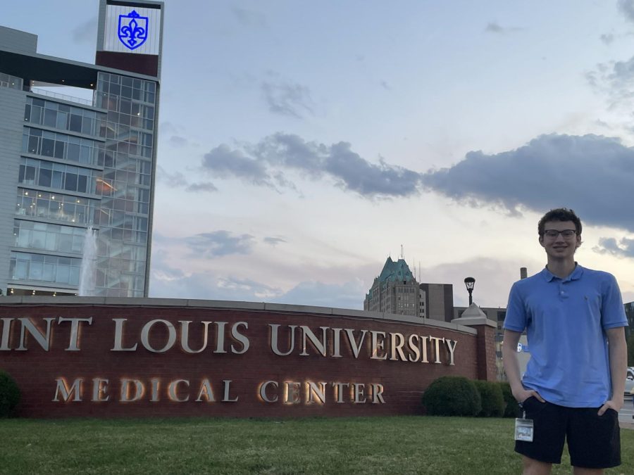 Junior David Hawiger poses in front of the St. Louis University Medical Center, where he had the opportunity to shadow the hospital’s medical team and research at the Pharmacology and Physiology lab. Hawiger participated in the lab’s ongoing studies to understand signal transductions induced by protein receptors in models of pain and cancer. “It was a great opportunity not only to work alongside physician-researchers but also to use lab equipment and to see and feel some of the structures you read about in class,” Hawiger said.