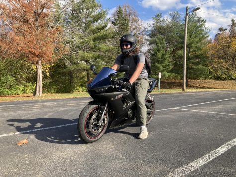 Junior Carter Rush hops on his motorcycle and starts the engine. Rush decided to take his bike to school at the beginning of the school year because it was convenient and fun to ride. “I like my bike. It gives me a thrill that I can’t find in anything else,” Rush said.
