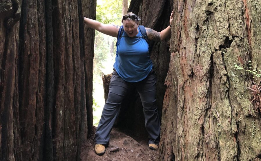 At+Redwood+National+Park+in+Northern+California%2C+along+the+trails+of+Trillium+Falls%2C+Design+Arts+teacher+Kristi+Ponder+hikes+through+the+giant+trees+exploring+all+the+scenery+along+the+trail.+Ponder+dreamed+of+traveling+as+a+little+girl.+%E2%80%9CThese+trees+don%E2%80%99t+grow+anywhere+else.+I+felt+so+amazed+but+also+in+awe%2C%E2%80%9D+Ponder+said.+