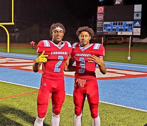 Before beginning their college football journey, alumni Ja’Marion Wayne and Tre Bell smile after one of their final rides together. The athletes kept in contact and encouraged and inspired each other along their new paths. “I miss everything about high school football. I wish I had another year to play with [alumni] Ja’marion Wayne, Seth Young, Tyree Simms and [senior] Phillip Jordan and [junior] Trent Livingston. I miss all of my guys and playing in front of a student section where you know every kid. It isn’t something you get in college,” Bell said. 