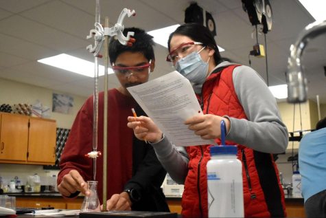 Adding a base to their acidic liquid to complete a titration, juniors Mazz Siddiqui and Sofia Wu  successfully neutralized the liquid. They did the math to find the molarity of the mixture. “The labs were the most interesting [part of chemistry] because I stood up and did something innovative,” Wu said. “The math [was sometimes challenging because it] needed to be correct in a chain reaction; you needed the first question to be right to do the next one right.” 