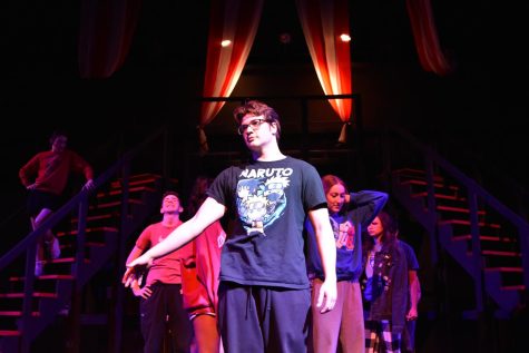 During the song “Morning Glow” in the spring musical “Pippin,” senior Andrew Gwin acts as the main character that just killed his father in hopes of finding the meaning of his life. With just 24 hours until the first show, Gwin and other cast members ran through choreography and lighting to ensure everything was set for the opening performance at 7 p.m. “My character was someone who longed to find meaning and wanted a purpose for his life. So he went throughout the musical searching for things to try,” Gwin said. “[To relate to my character] I thought of how my lines went together because I knew how the character was supposed to develop throughout the show, so I tried to match how someone would go through that.” 