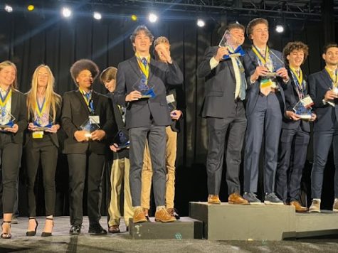 Parkway West students stand with their awards at the DECA State Career Development Conference. Twelve students returned as winners of the event. “It was a great experience since I was able to meet new people and spend time with my friends away from schools. Looking back, I’m happy I joined DECA and was able to go to the state competition,” junior Max Brophy said.
