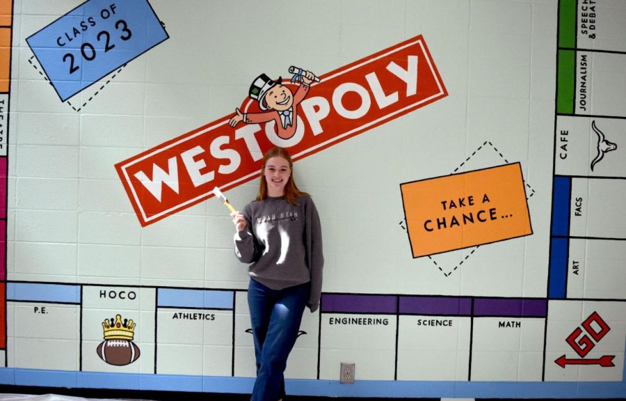 An idea comes to life thanks to senior Darcie Morgans painting skills and imagination. Her hard work in her previous art classes culminated in Morgans painting of a West-o-poly themed senior wall for the class of 2023. Morgan plans to study art in college. My art teachers have had a big influence on me. When they see potential in my work, I get excited for my future and always want to improve my technique, Morgan said.